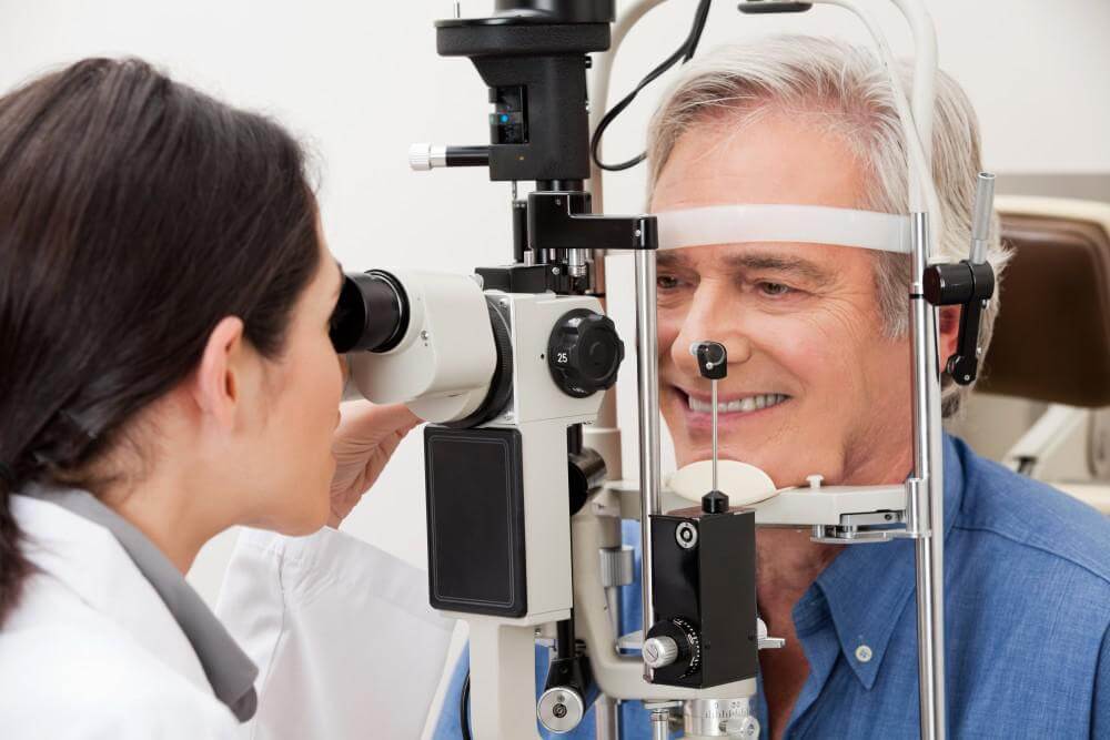 Man having his eye examined